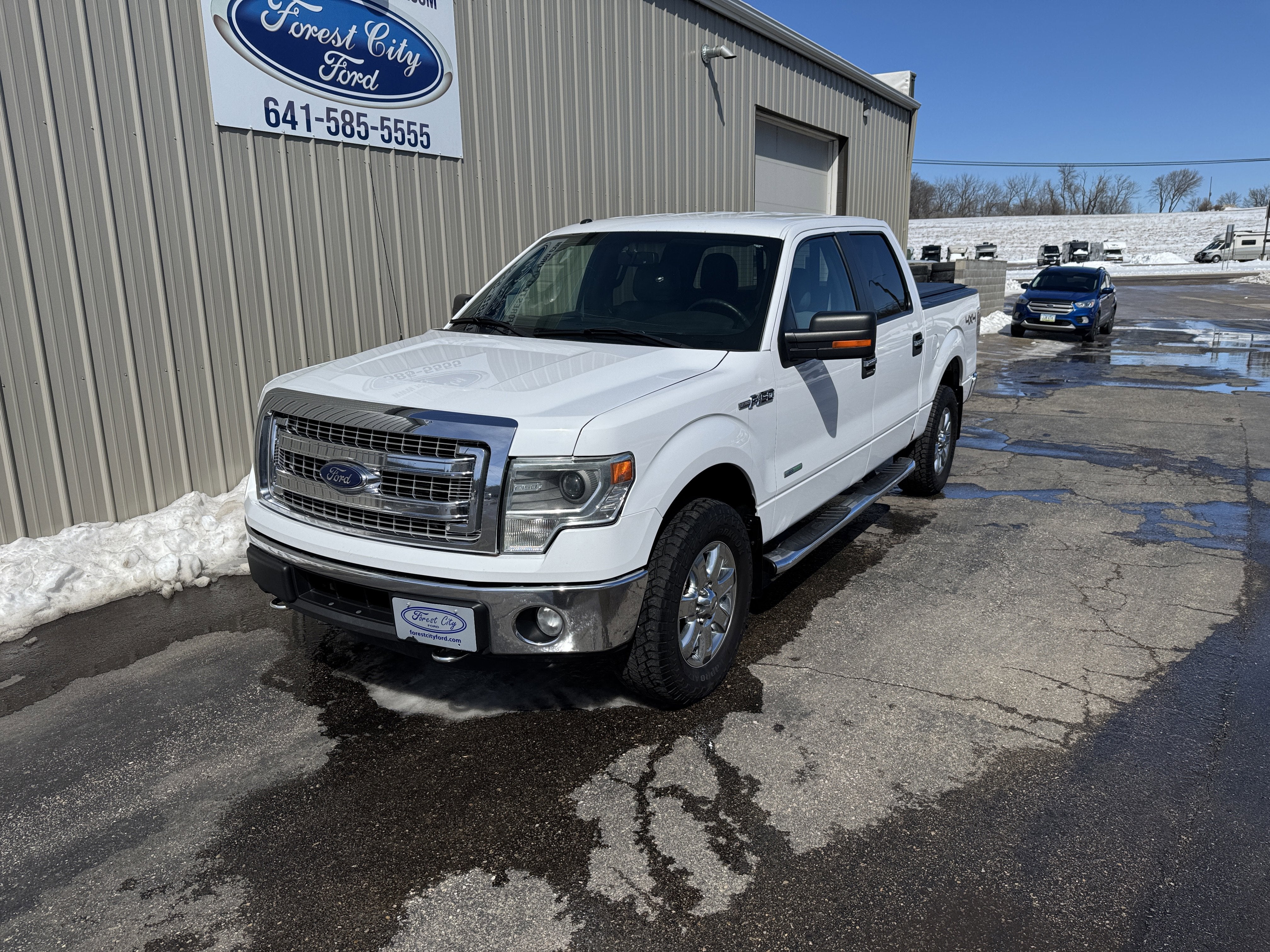 Used 2014 Ford F-150 XLT with VIN 1FTFW1ET4EKF23177 for sale in Forest City, IA